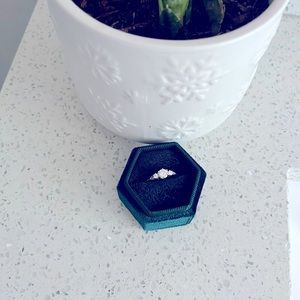 Moissanite Ring. 0.5 ct + silver. Size 7. It comes with the box.